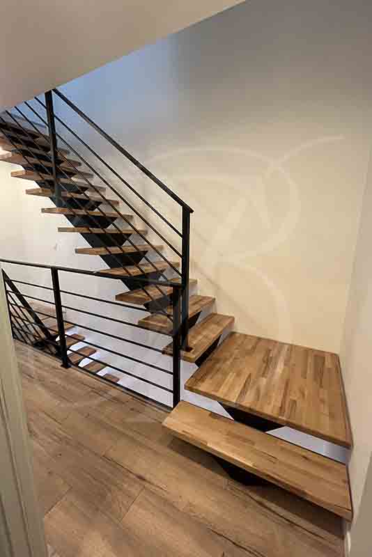Pose d'un escalier avec un étage